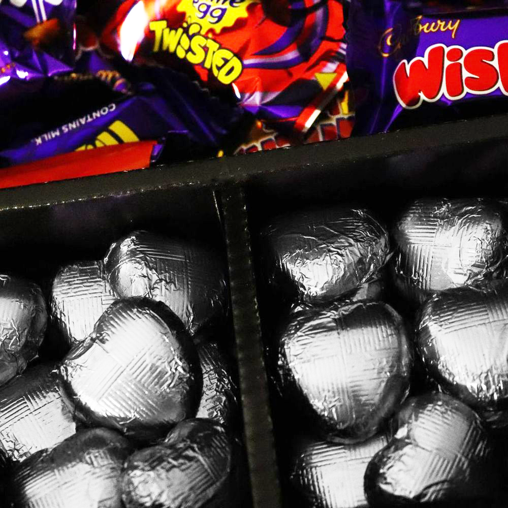 Chocolate Cadbury Heroes with Regal Purple Roses Bouquet